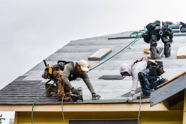 Professional Gutter Installation technician working in Marquette, NE